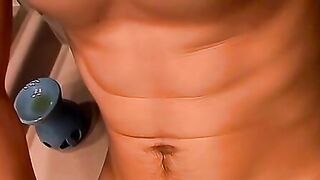 Horny Zack Randall strips off in the bathroom before rubbing his cock