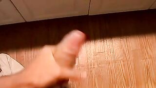 Horny Zack Randall strips off in the bathroom before rubbing his cock