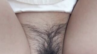 Little Japanese babe peeing while fingered in public