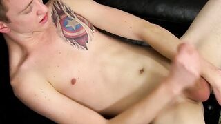 Inked cutie shoves plastic inside of his ass and masturbates