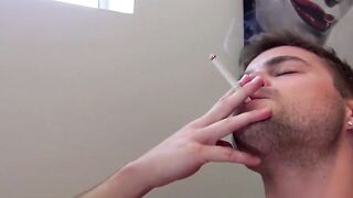 Handsome Dustin menthol smokes while beating his rods
