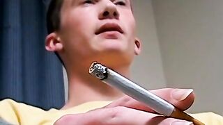 Hottie Braden Spence smokes reds while jerking and end it with a massive load of cum
