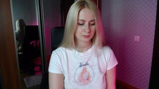 Blonde caresses her anal hole with a sex toy