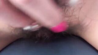 Beautiful Asian babe outdoor plays with pussy before pissing