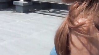 Beautiful Asian babe outdoor plays with pussy before pissing