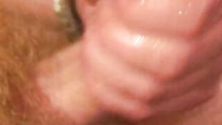 Long haired ginger amateur jerks off his cock solo on cam