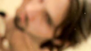 Straight jock with long hair jerks his massive hard dick off