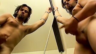 Straight jock with long hair jerks his massive hard dick off