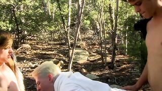Young hotties barebacking their friend in the forest