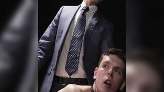 Sexy Ethan Tate widened his legs to welcome the throbbing dick of suited Jonah Wheele