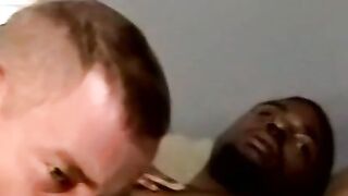 Amateur black guy jerks off solo with white dude kissing him