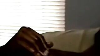 Amateur black guy jerks off solo with white dude kissing him