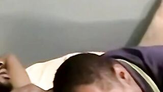 Amateur black guy jerks off solo with white dude kissing him