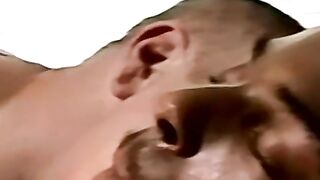 Amateur black guy jerks off solo with white dude kissing him