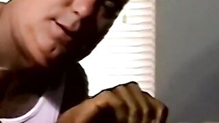 Amateur black guy jerks off solo with white dude kissing him