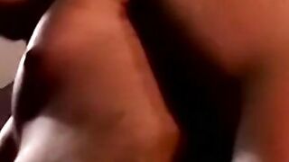 Amateur black guy jerks off solo with white dude kissing him
