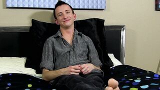 Charming young man interviewed before dildoing his ass