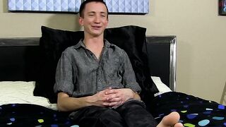Charming young man interviewed before dildoing his ass