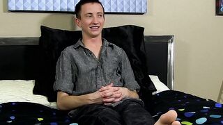 Charming young man interviewed before dildoing his ass