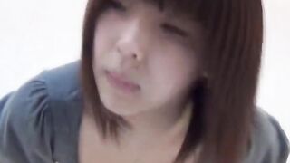 Japanese woman makes a major pool of piss on the floor