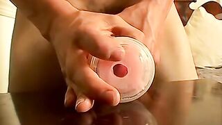 Beautiful young jock Alexxx pounds a sex toy and blasts his hot loads