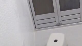 Asian babe filmed on hidden camera fingering her tight pussy