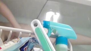 Asian babe filmed on hidden camera fingering her tight pussy