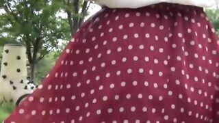 Gorgeous Asian babe outdoor rubbing hairy pussy and pissing