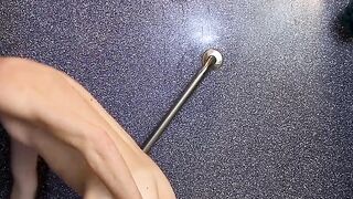 Lad moans as he plays with ass and tugs cock in the shower