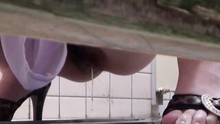 Ravishing Asian women got on camera while peeing in vehicle