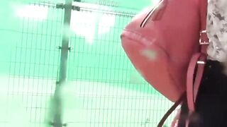 NipponPissTV.com - Debauched Asian schoolgirl pissing hard in public view on streets