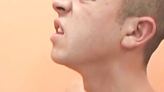 Barebacked young Latino twink cums from cock in his ass