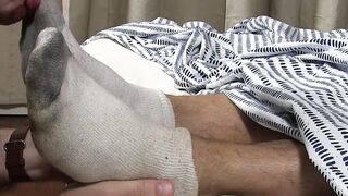 Handsome and muscular Brad enjoys while being feet worshiped
