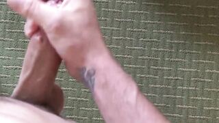 Athletic tattooed soldier is jerking off his lubed up cock