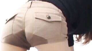 Cute Japanese pissing her undies and fills the cup