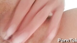 Baby caresses bald snatch close-up
