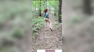 Bombshell redheaded snatch walks through the woods almost nude
