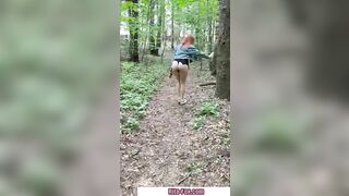 Bombshell redheaded snatch walks through the woods almost nude