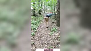 Bombshell redheaded snatch walks through the woods almost nude