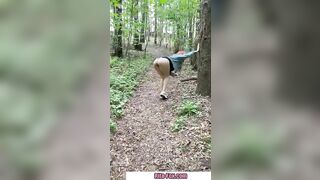 Bombshell redheaded snatch walks through the woods almost nude