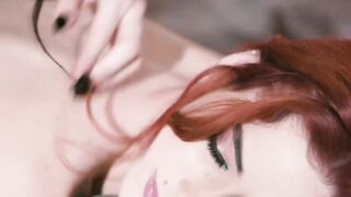 Delilah Day and Theodora Day scissor after a massage