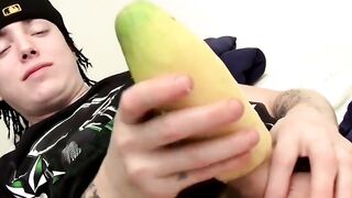 Straight tattooed thug playing with his big cock and a fruit