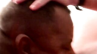 Chubby black amateur gagging on hard white cock
