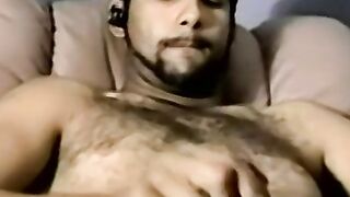 Bearded dude with hair on chest jerks off in amateur video