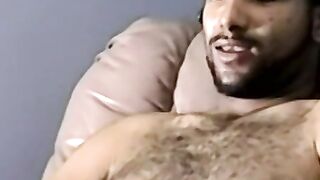 Bearded dude with hair on chest jerks off in amateur video