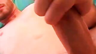Gorgeous Garrett covered his chest with his massive load after stroking his gorgeous