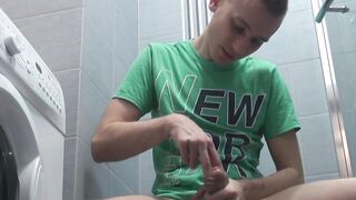Short haired twink Patrick jerks off his uncut prick solo