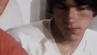 Very cute Scott admires Jeffs tasty and massive dick by stroking it
