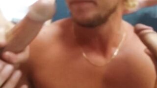 Athletic guy sucks on two rock hard cocks in kinky pawnshop