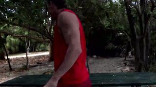 Muscled lifeguard ass stretched at the beach
